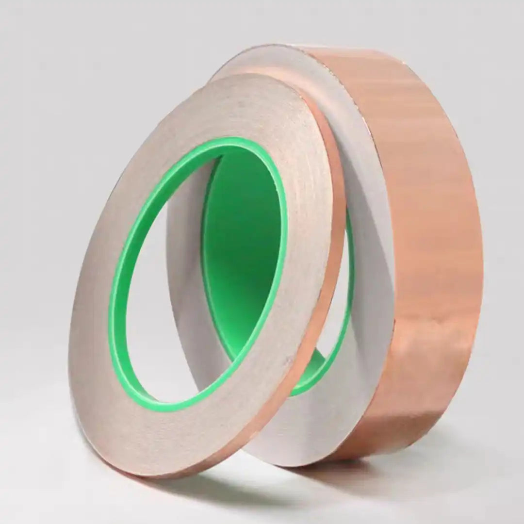 Adhesive backed copper foil sheet with single-sided conductive surface for EMI shielding