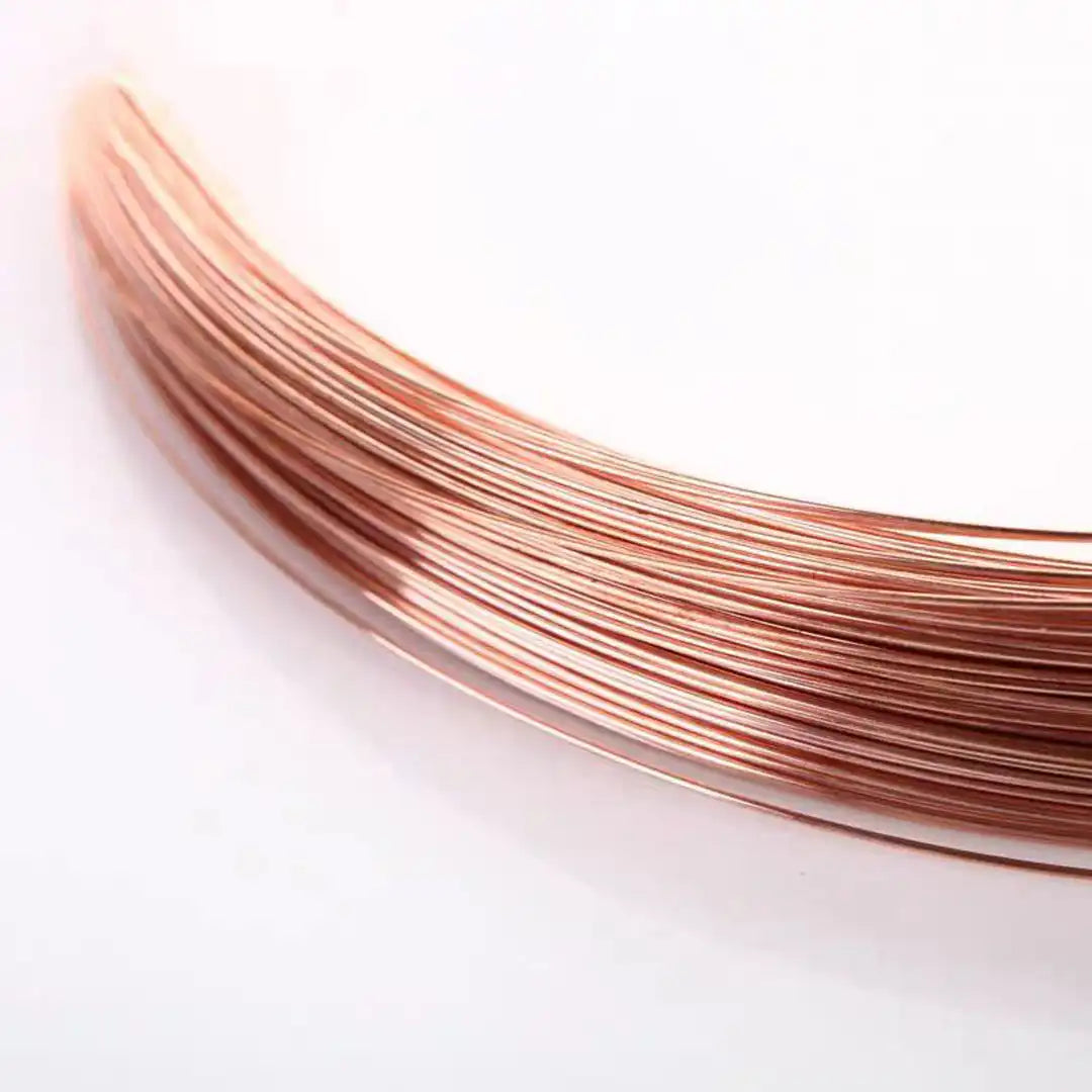 Close-up of bare copper wire showing shiny uncoated surface, no insulation or plating