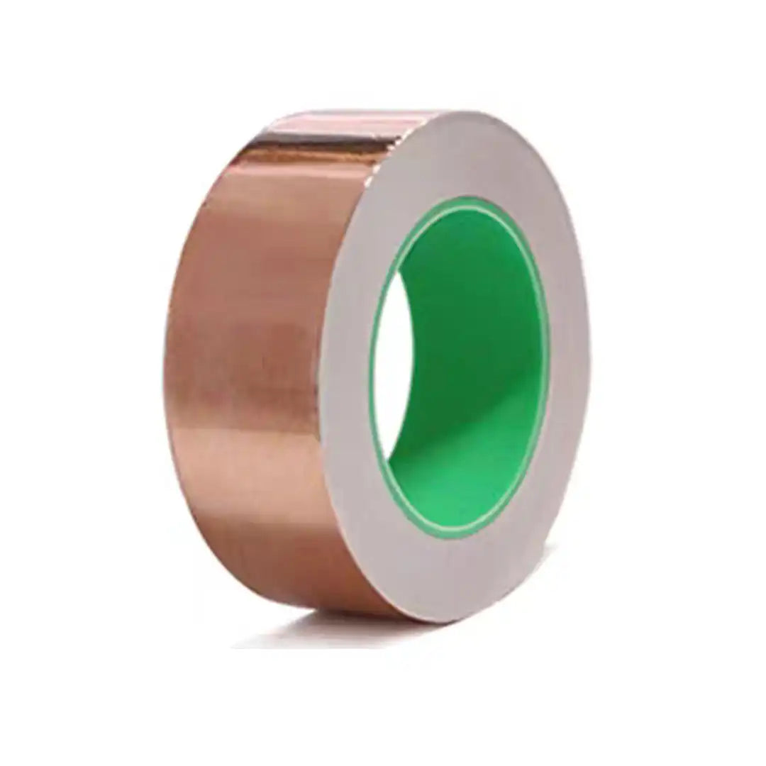 Close-up of non-conductive adhesive backing on single-sided copper foil with release liner